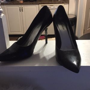 Black pumps with crystal design on heels